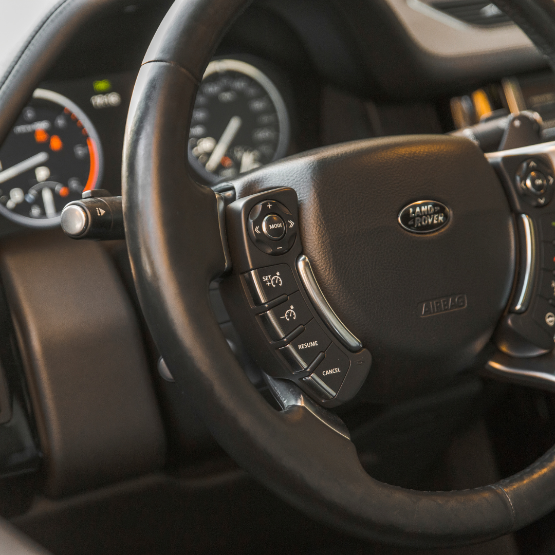 A Land Rover steering wheel with Automatic Driver Recognition.