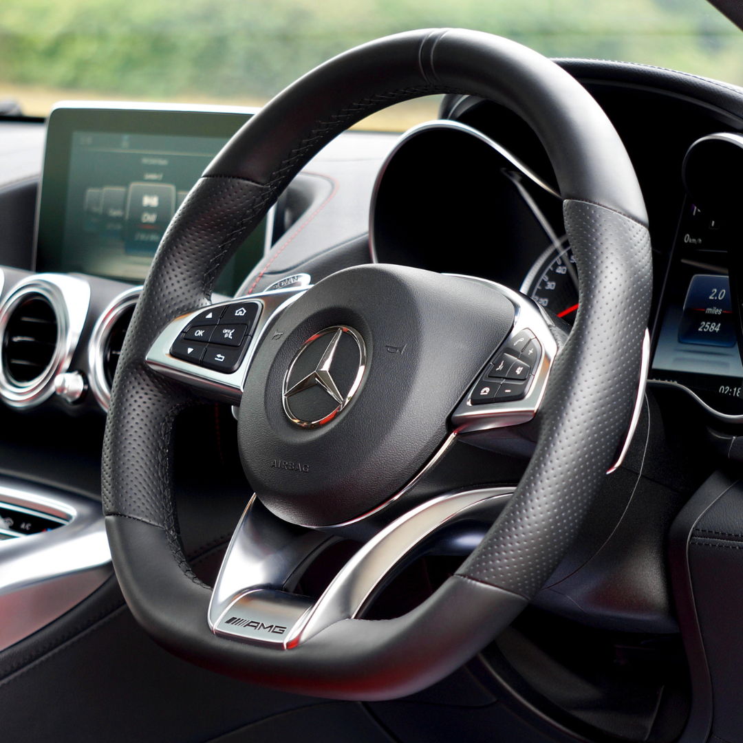 A Mercedes steering wheel with Automatic Driver Recognition.