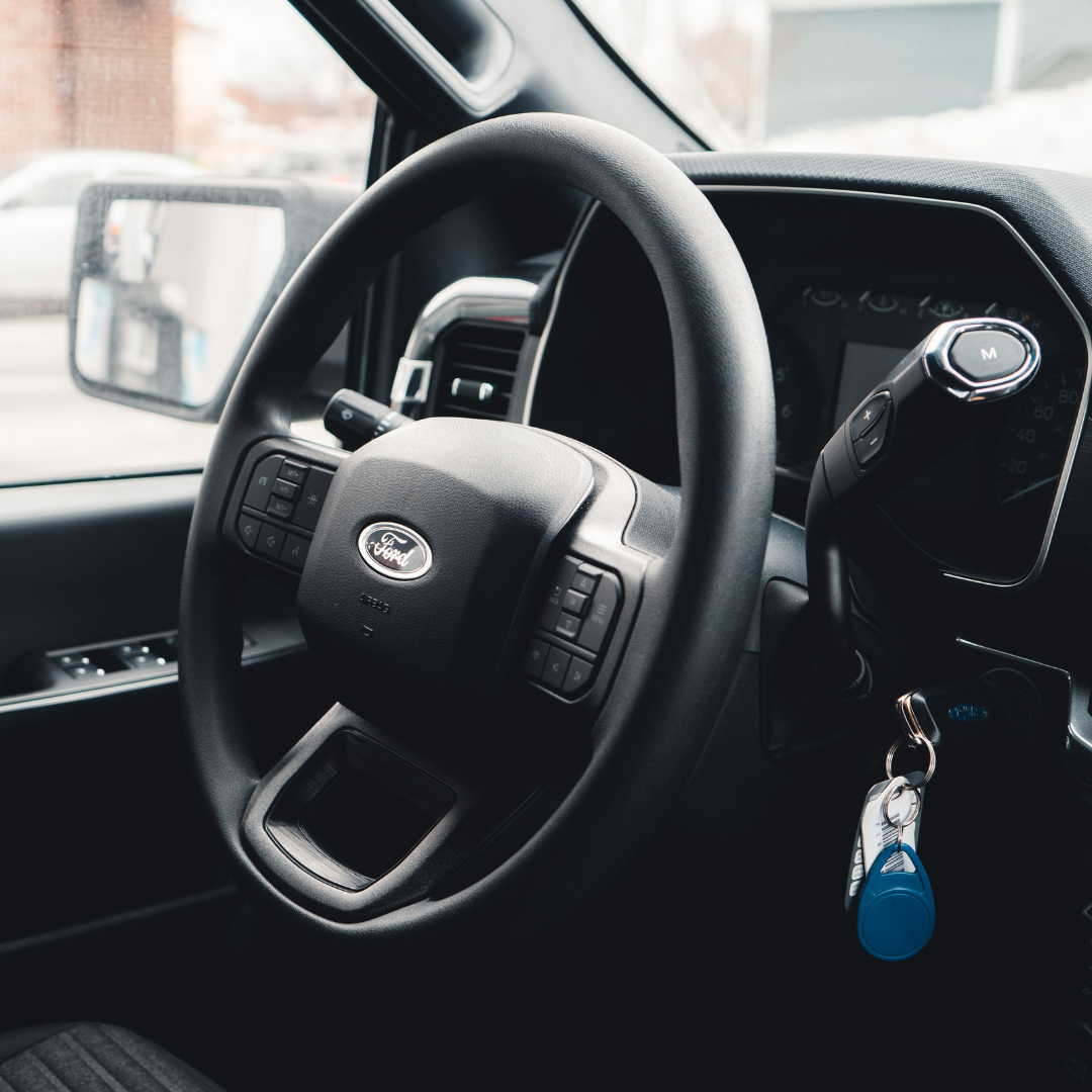 A Ford steering wheel with Automatic Driver Recognition.